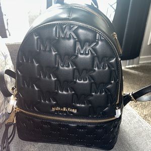 Selling my MK back pack I never used